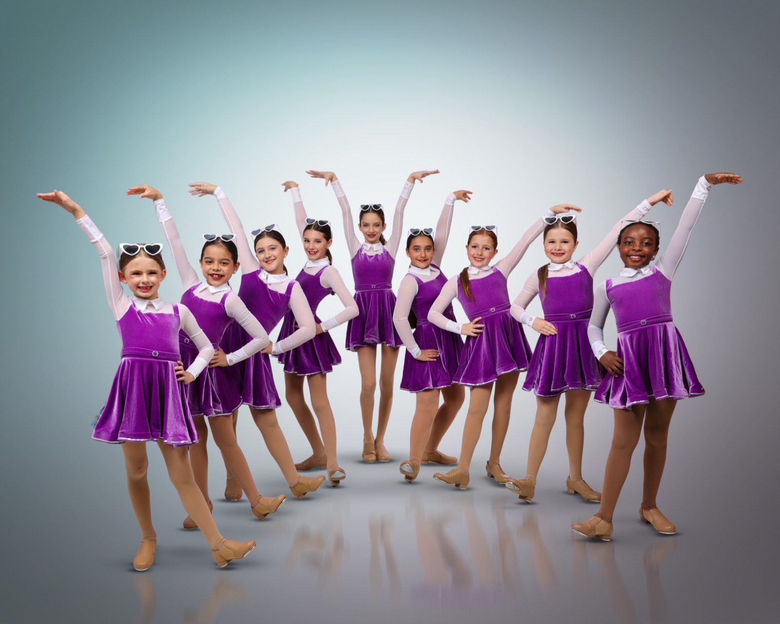 Tap dancers practicing rhythm and footwork.